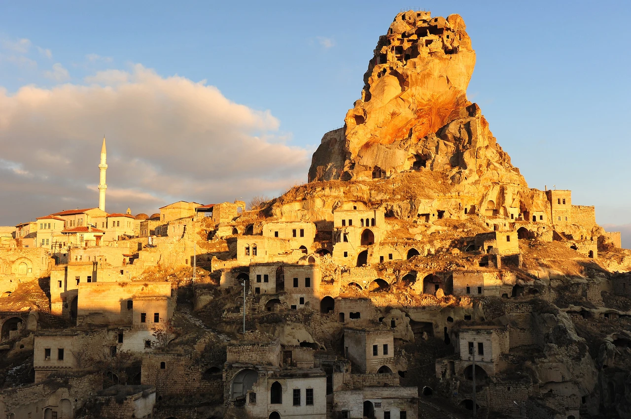 Ortahisar Castle and the surrounding stone houses in daylight