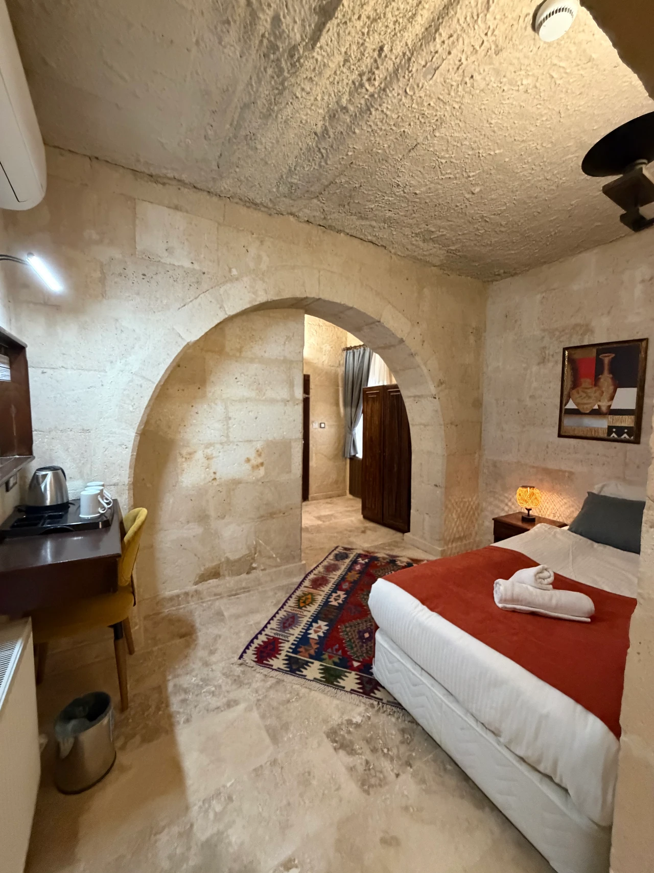 A room with stone flooring